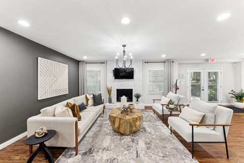 a living room with couches and a table